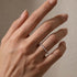 Marquise eternity band styled with a solitaire ring