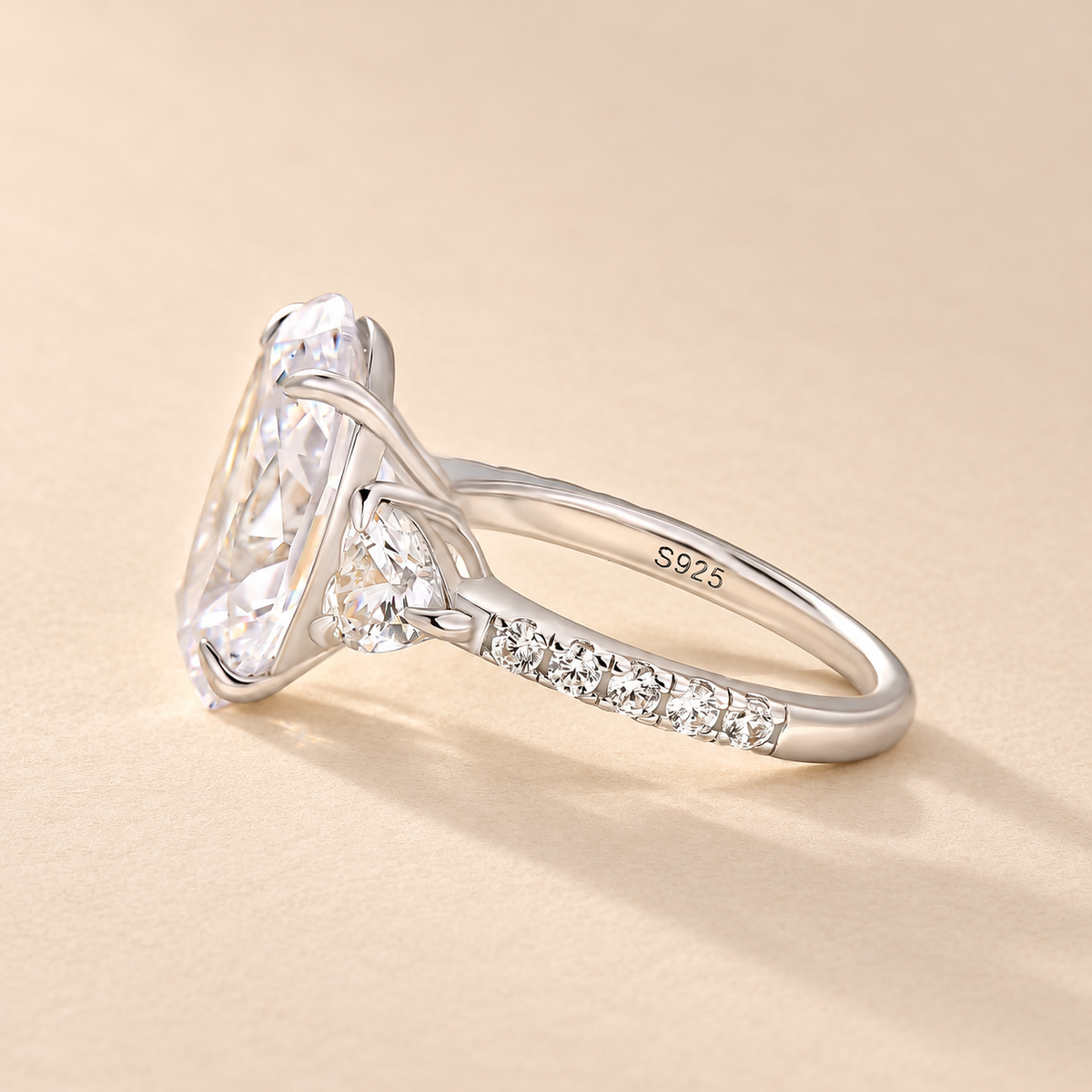 7.0Ct Oval Cut Three-Stone Engagement Ring with Heart Side Stones