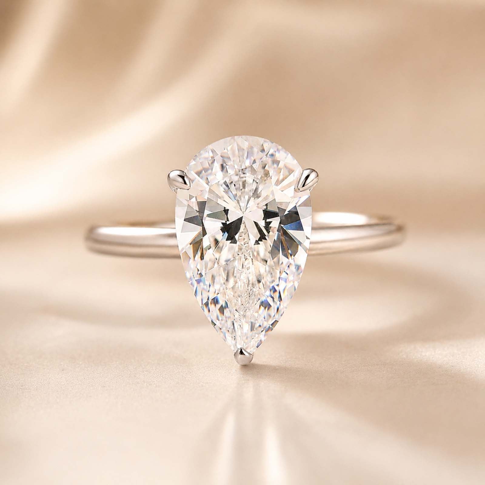 S925 4.0Ct Pear Cut Hidden Halo Simulated Diamond Engagement Ring in Sterling Silver