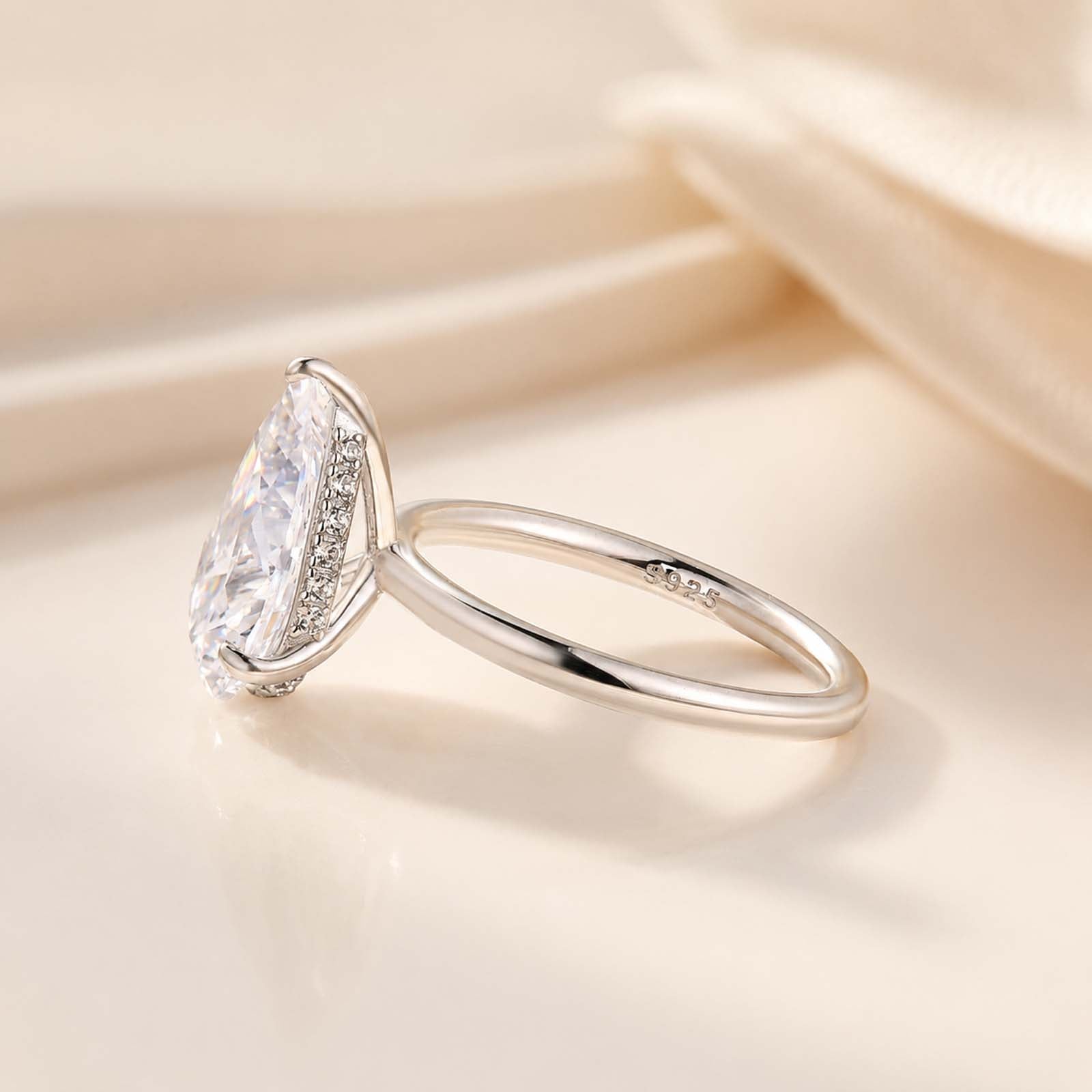 S925 4.0Ct Pear Cut Hidden Halo Simulated Diamond Engagement Ring in Sterling Silver
