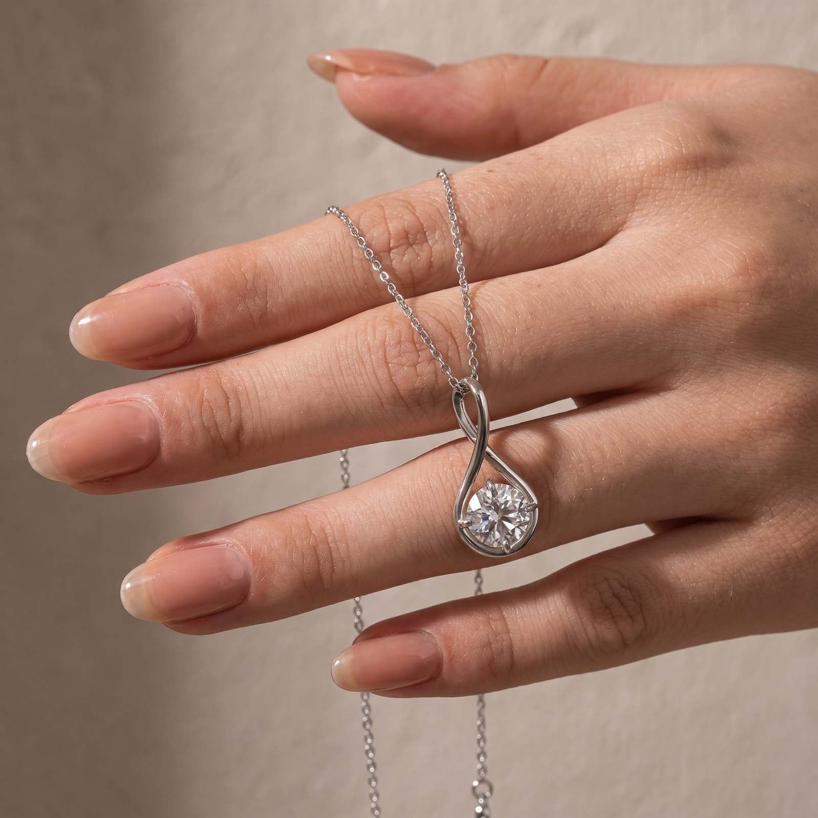 S925 Moissanite 2.0Ct Twist Round Cut Pendant Necklace In Sterling Silver