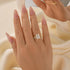 Radiant cut engagement ring and band worn on hand