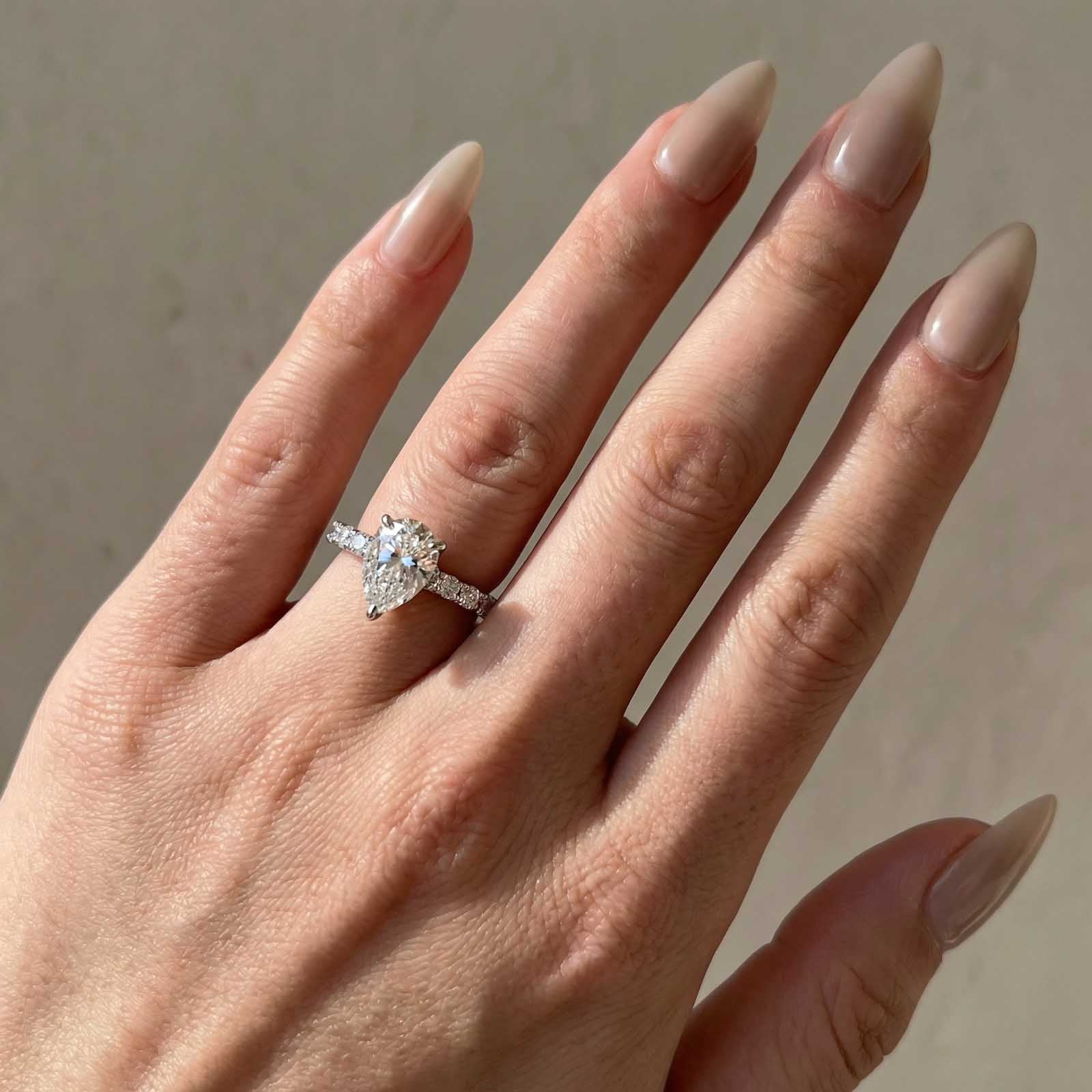 Louily Moissanite 2.0 Carat Pear Cut 18K White Gold Pavé Band Solitaire Style Engagement Ring