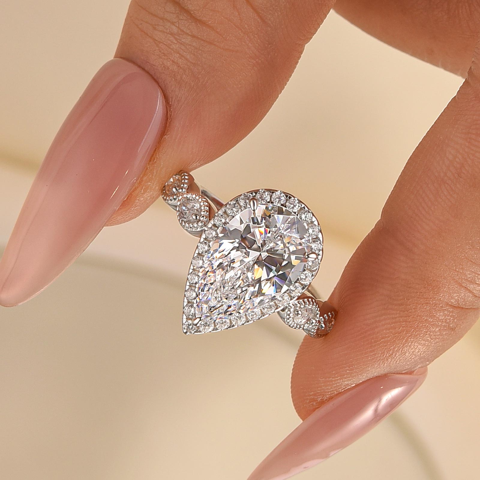 Louily Classic 4.0Ct Pear Cut Halo Design Engagement Ring In Sterling Silver