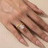 Yellow gold plated cushion cut ring worn on hand