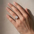 Cushion Cut Split Shank Ring Worn on Woman’s Hand