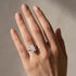 Radiant cut moissanite engagement ring worn on hand