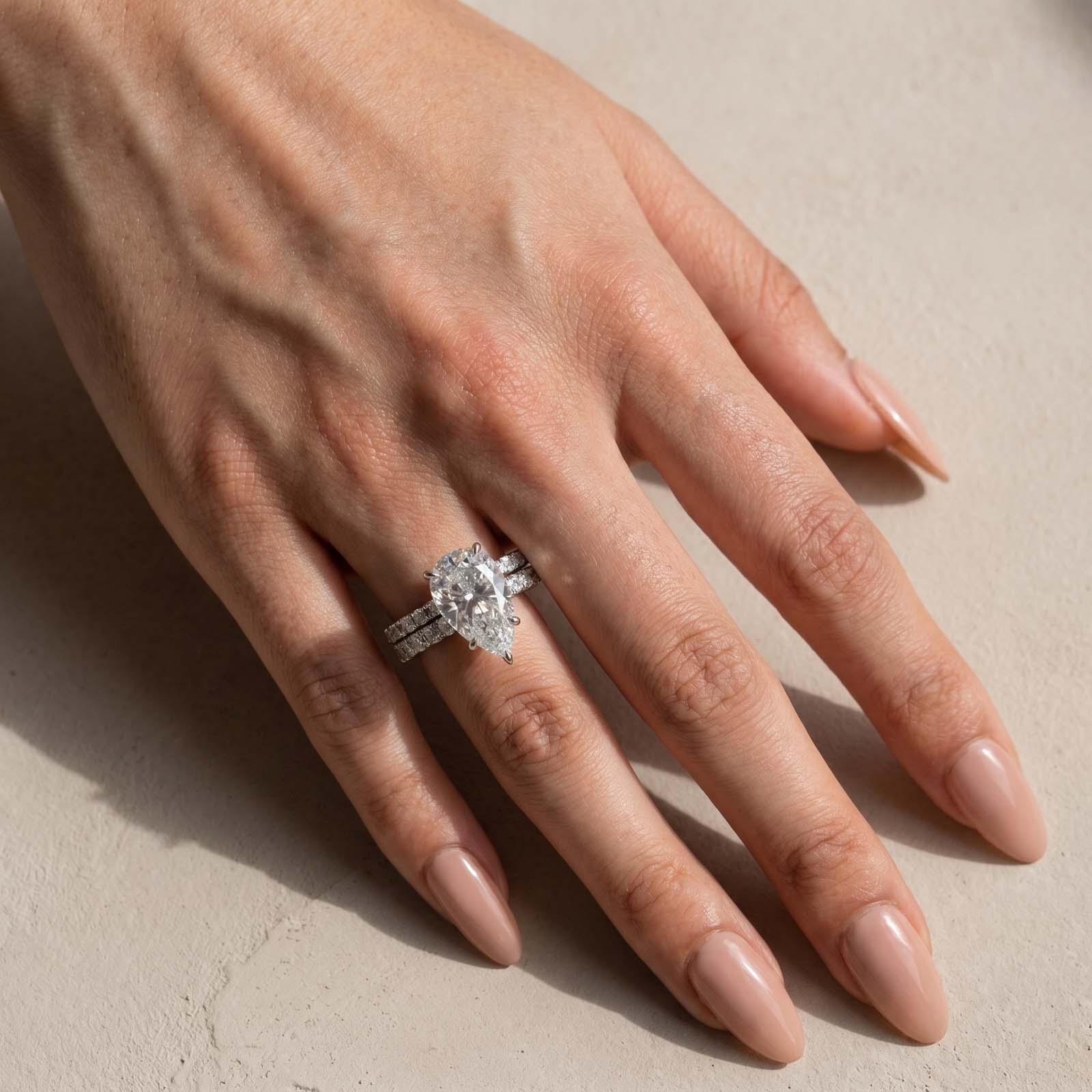 S925 5.0Ct Pear Cut Engagement Ring in Sterling Silver with Classic Open Wedding Band
