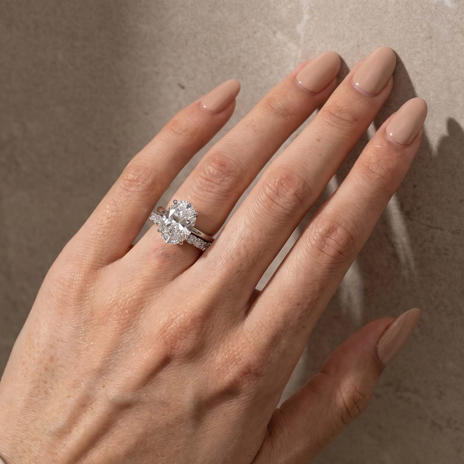 S925 4.5Ct Oval Cut Solitaire Engagement Ring in Sterling Silver with Open Round Cut Eternity Wedding Band