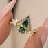 Green pear moissanite split shank ring close-up