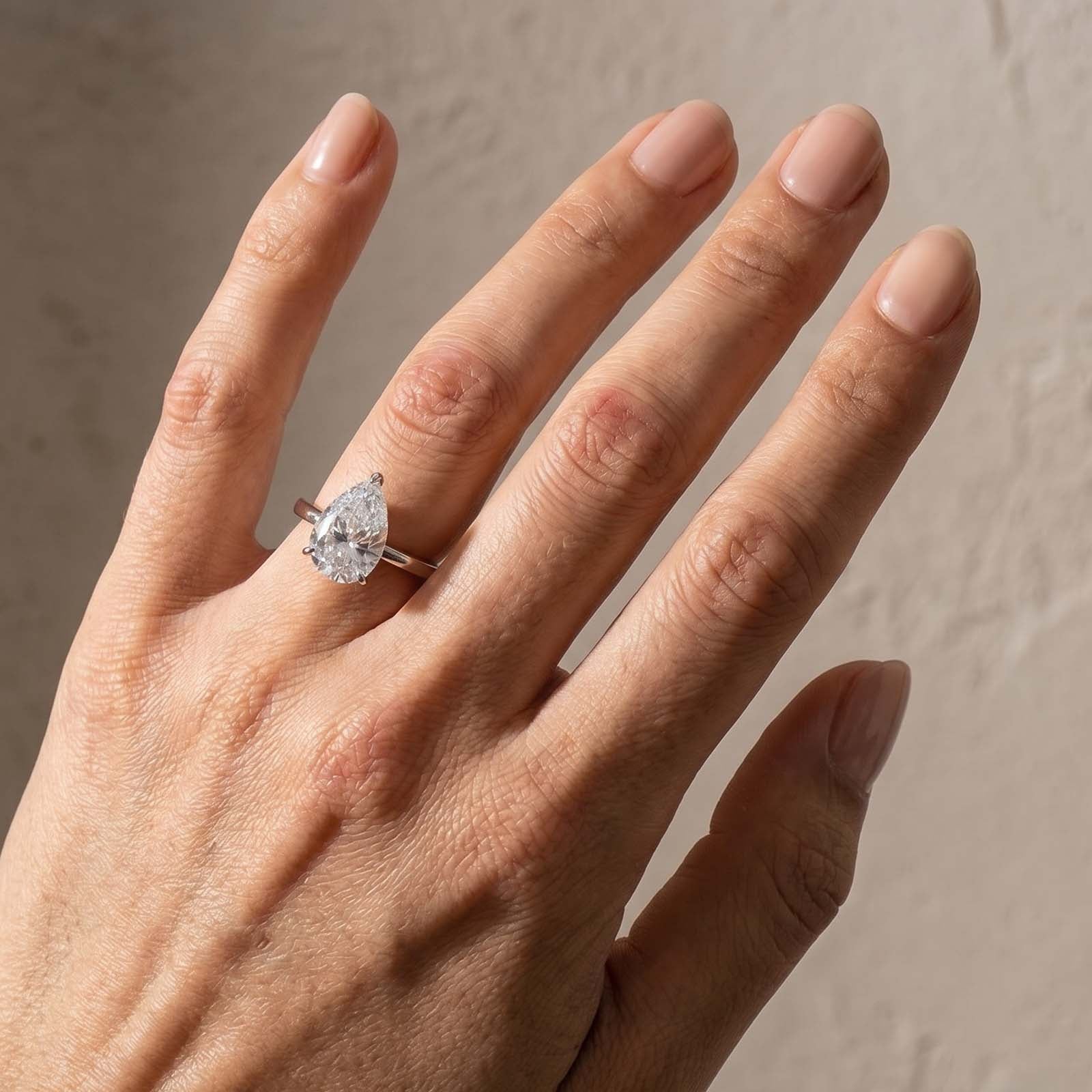 S925 4.0Ct Pear Cut Hidden Halo Simulated Diamond Engagement Ring in Sterling Silver