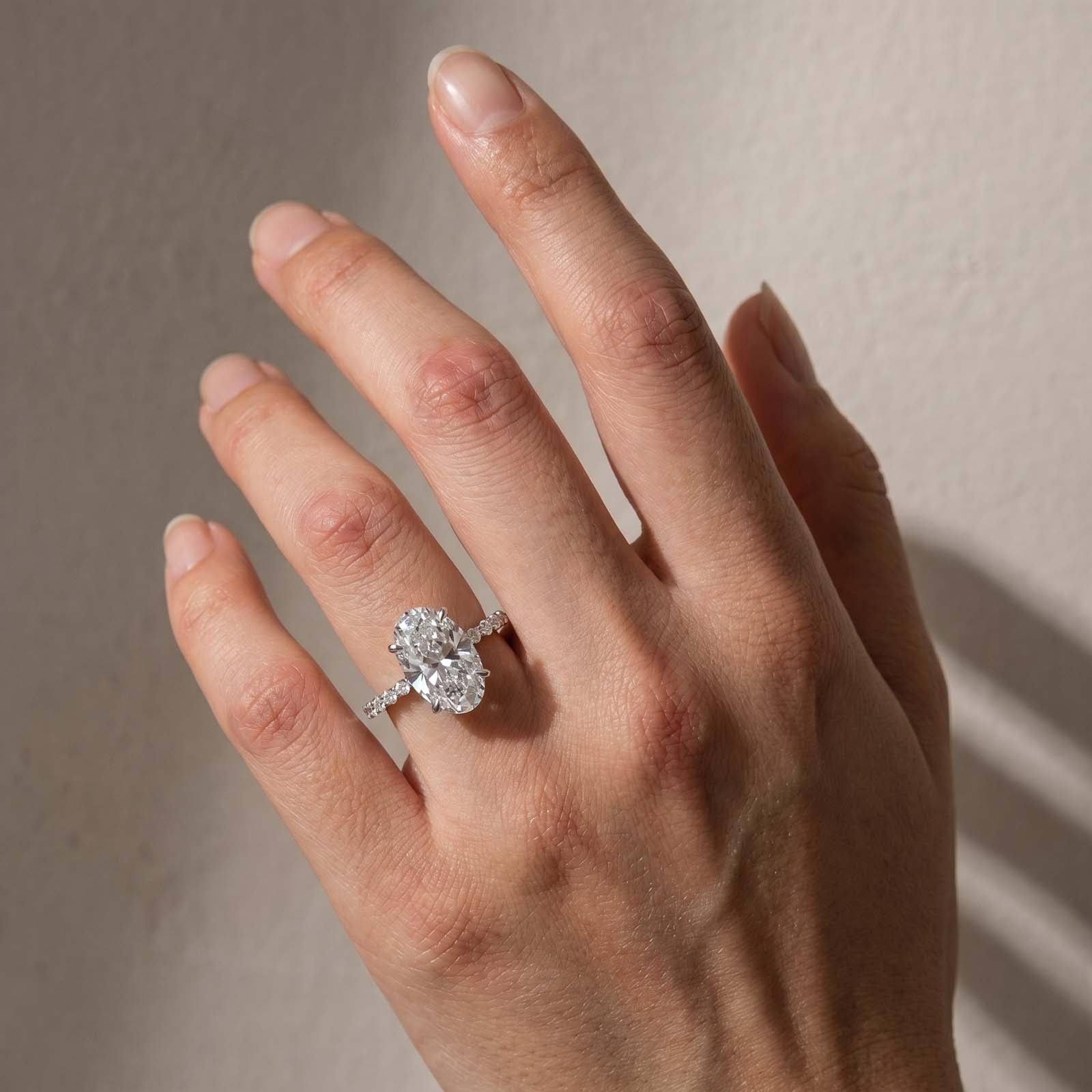 S925 5.0Ct Oval Cut Side Stone Simulated Diamond Engagement Ring For Everyday Wear
