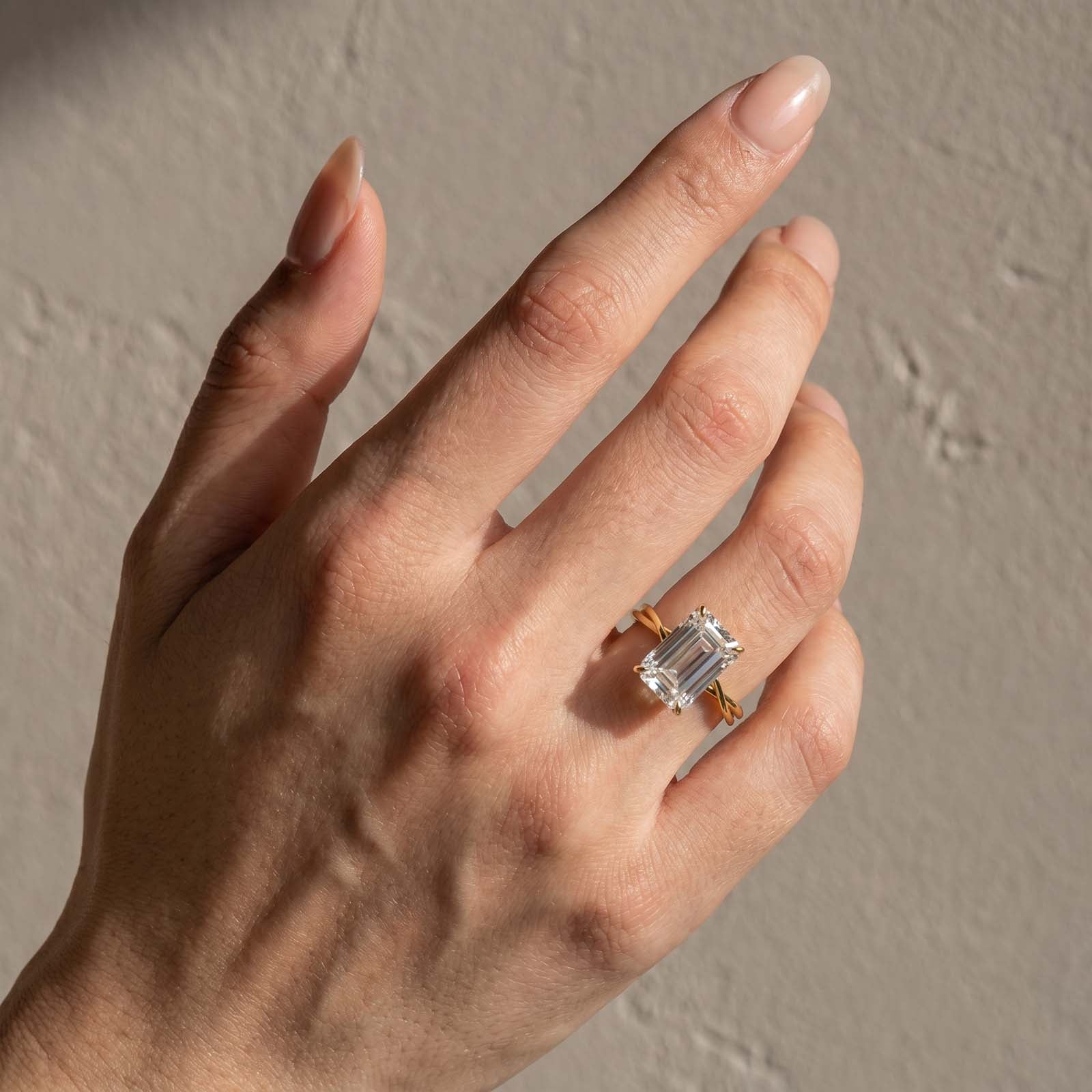 S925 5.0Ct Emerald Cut Hidden Halo Twist Bridal Ring in Sterling Silver