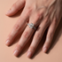 Woman wearing a radiant moissanite wedding ring set