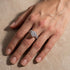 Three-piece moissanite wedding ring set worn on hand