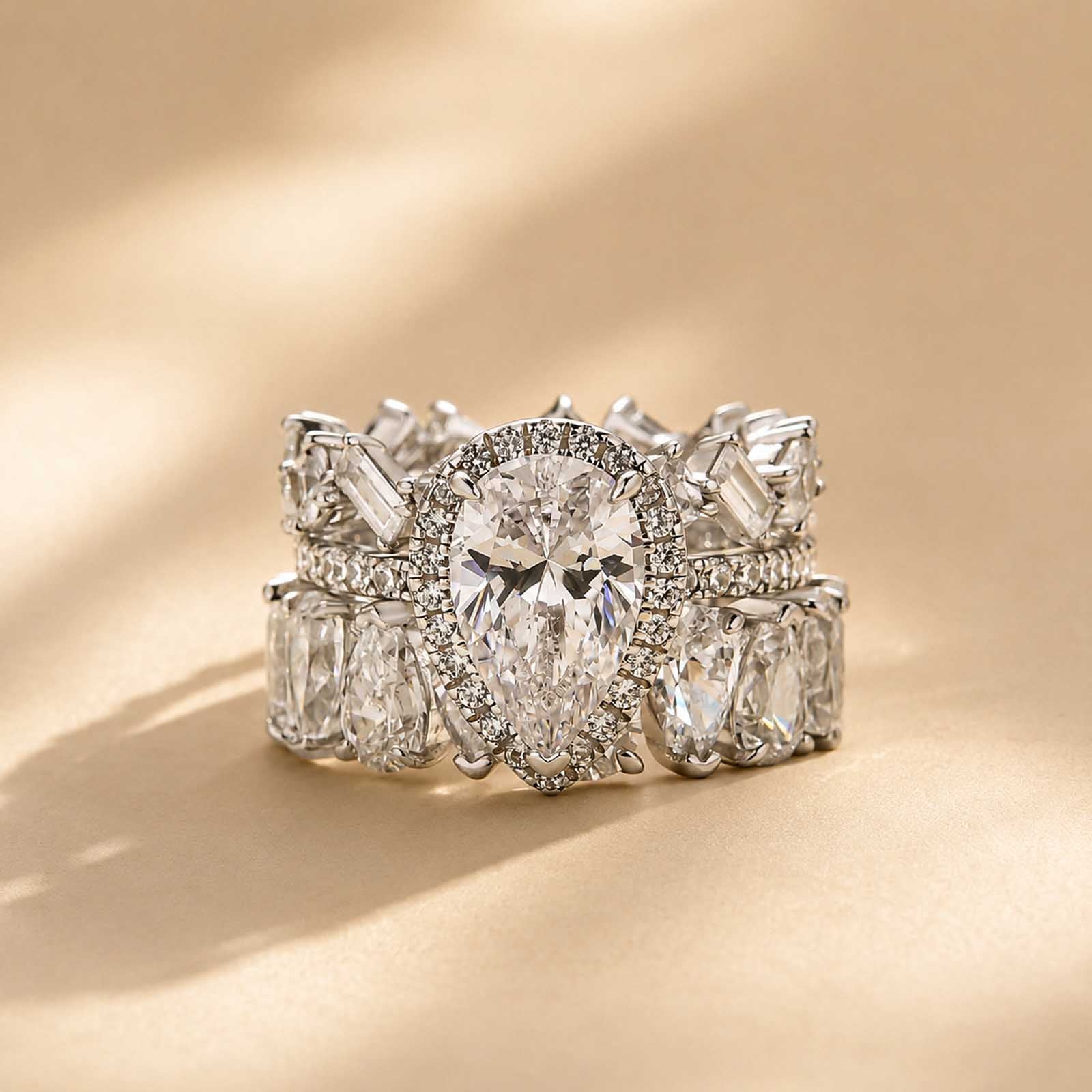 S925 2.2 Carat Halo Pear Cut Wedding Ring Set With Two Luxurious Wedding Bands For Women