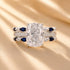 Front view of blue accent cushion cut insert wedding ring set