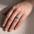 Princess cut wedding ring and two bands worn on hand