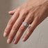 Three piece princess cut bridal ring set on finger
