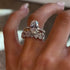 Two-tone 4.0Ct oval cut wedding ring set on hand