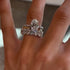 Two-tone Oval cut three-piece bridal ring stack close-up
