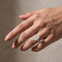 Radiant cut wedding ring set stacked on hand