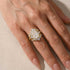 Close-up of radiant cut engagement ring with pavé band