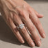 Radiant cut wedding ring set worn in soft natural light