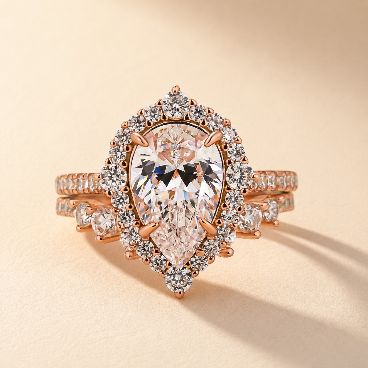 S925 Elegant 2.2 Carat Halo Pear Cut Rose Gold Bridal Ring Set In Sterling Silver