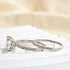 Side view of white gold princess cut wedding ring set