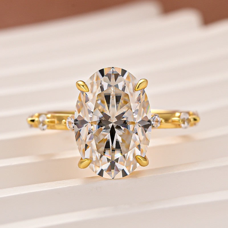 Yellow Gold 5.5 Ct Oval Cut Moissanite Engagement Ring In Sterling Silver