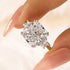 6.5Ct Crushed Ice Three-Stone Travel Ring Held Between Fingers