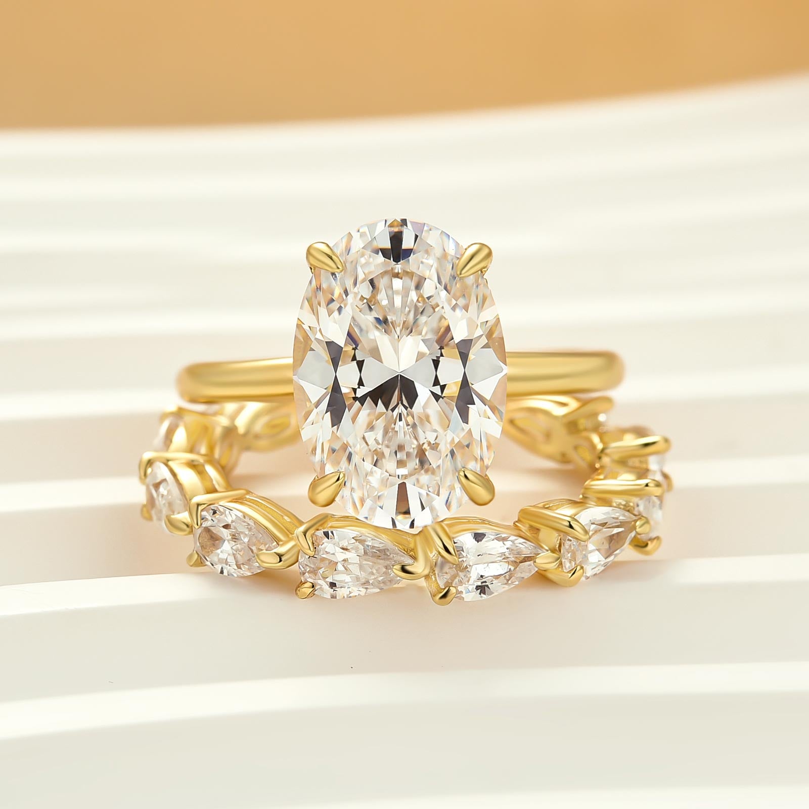 Elegant 5.5Ct Oval Cut Yellow Gold Wedding Ring Set with Pear Cut Band for Women