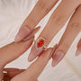 2.2 Carat Simulated Diamond Pear Cut Red Stone Halo Engagement Ring - louilyjewelry