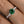 Louily Twist Round Cut Emerald Green Engagement Ring In Sterling Silver