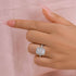 Vintage halo engagement ring close-up on finger