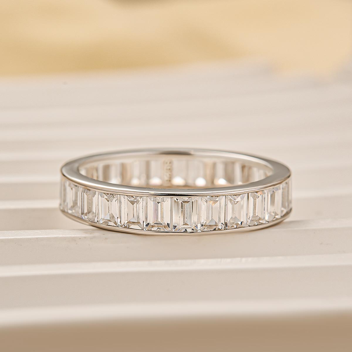 Luxury Surround Emerald Wedding Band In Sterling Silver