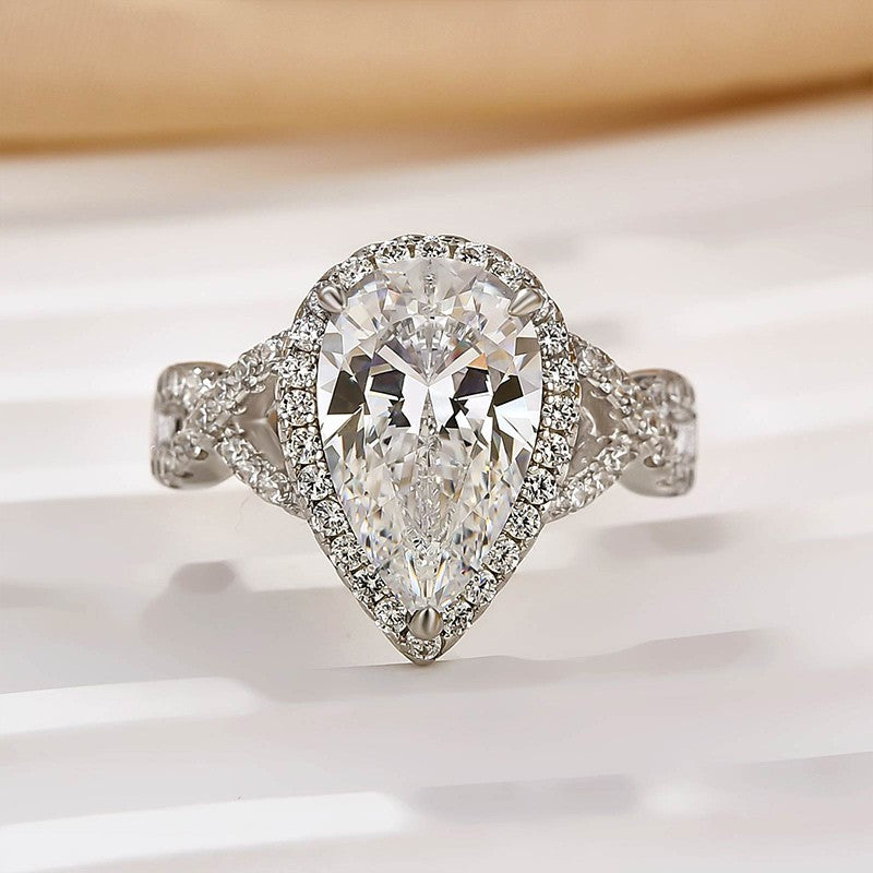 4.0Ct Halo Pear Cut Twist Travel Ring In Sterling Silver - louilyjewelry