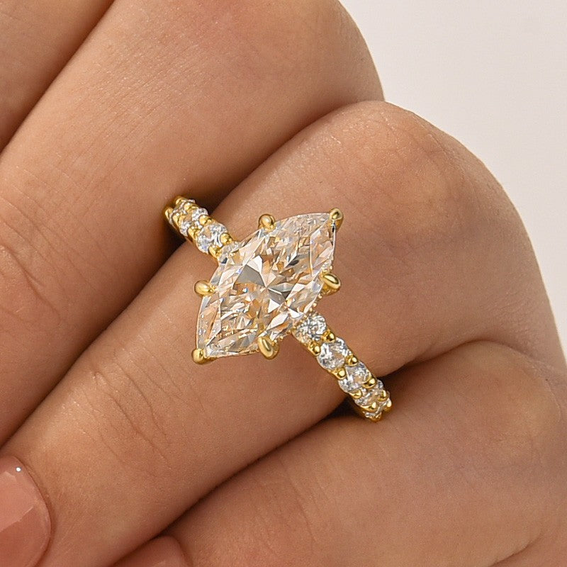 Moissanite 3.0 Ct Marquise Cut Side Stone Yellow Gold Engagement Ring In Sterling Silver