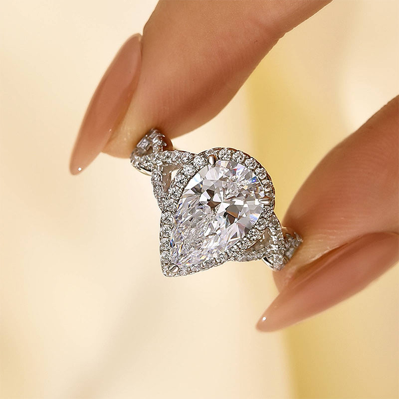 4.0Ct Halo Pear Cut Twist Travel Ring In Sterling Silver - louilyjewelry