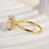 Side view of yellow gold oval cut solitaire engagement ring