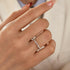 Marquise eternity band paired with a thin stacking ring