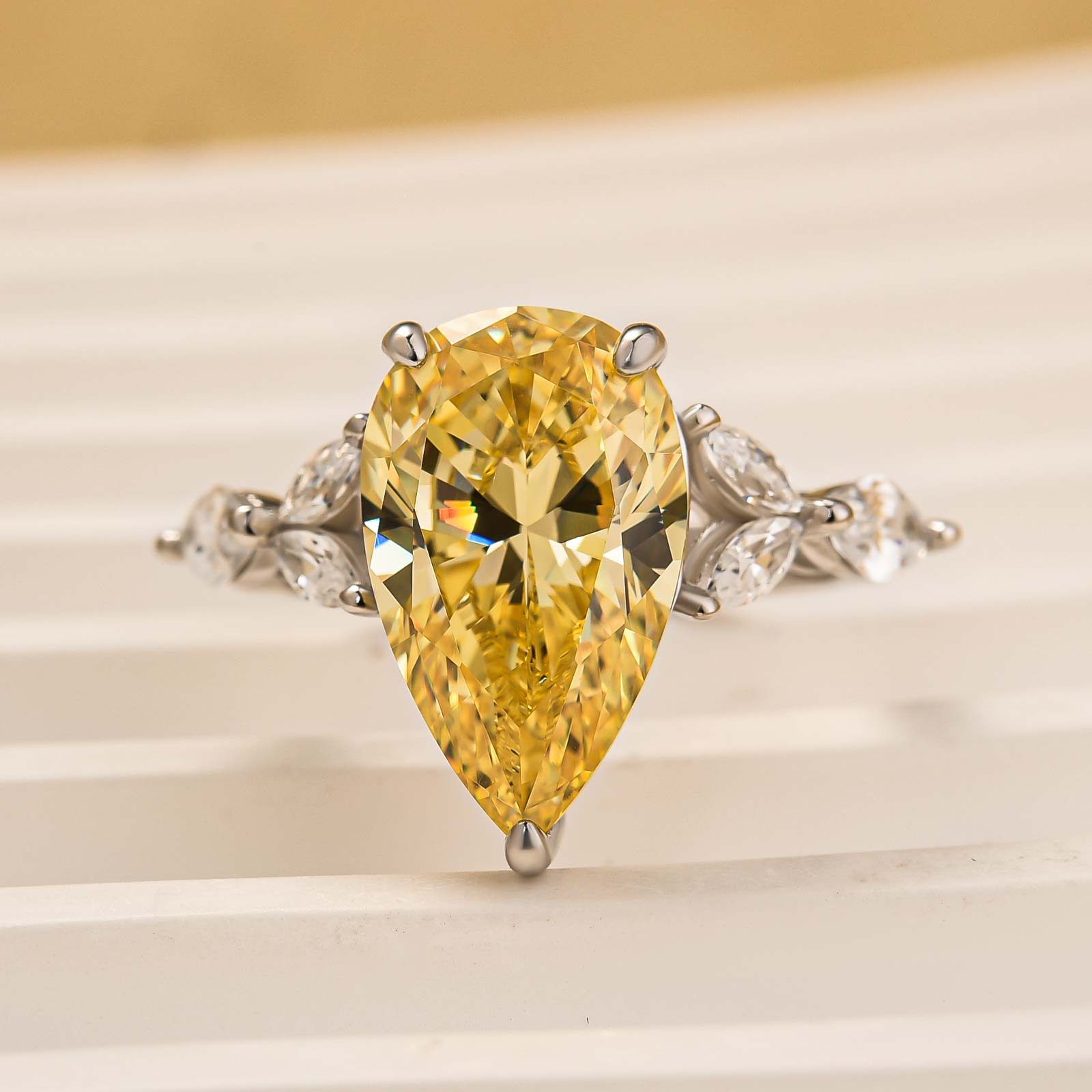 4.5Ct Pear Cut Yellow Stone With Design Marquise Side Stone Engagement Rings