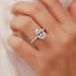 Rose gold 4.0Ct oval engagement ring worn on hand