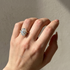 Yellow Gold Oval Cut Engagement Ring on Woman’s Hand