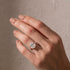 Cushion Cut Pavé Engagement Ring Close-Up on Hand