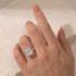 Cushion Cut Pavé Engagement Ring Close-Up on Hand