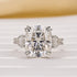 Moissanite cushion cut three stone engagement ring front view