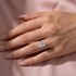 Woman styling a 3.5Ct oval cut engagement ring