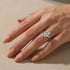 Yellow gold oval solitaire ring worn in natural light